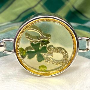 All the luck. Adorable clasp bracelet with encapsulated charms.